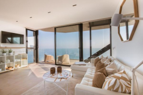 Modern sea front jacuzzi Blue Sky